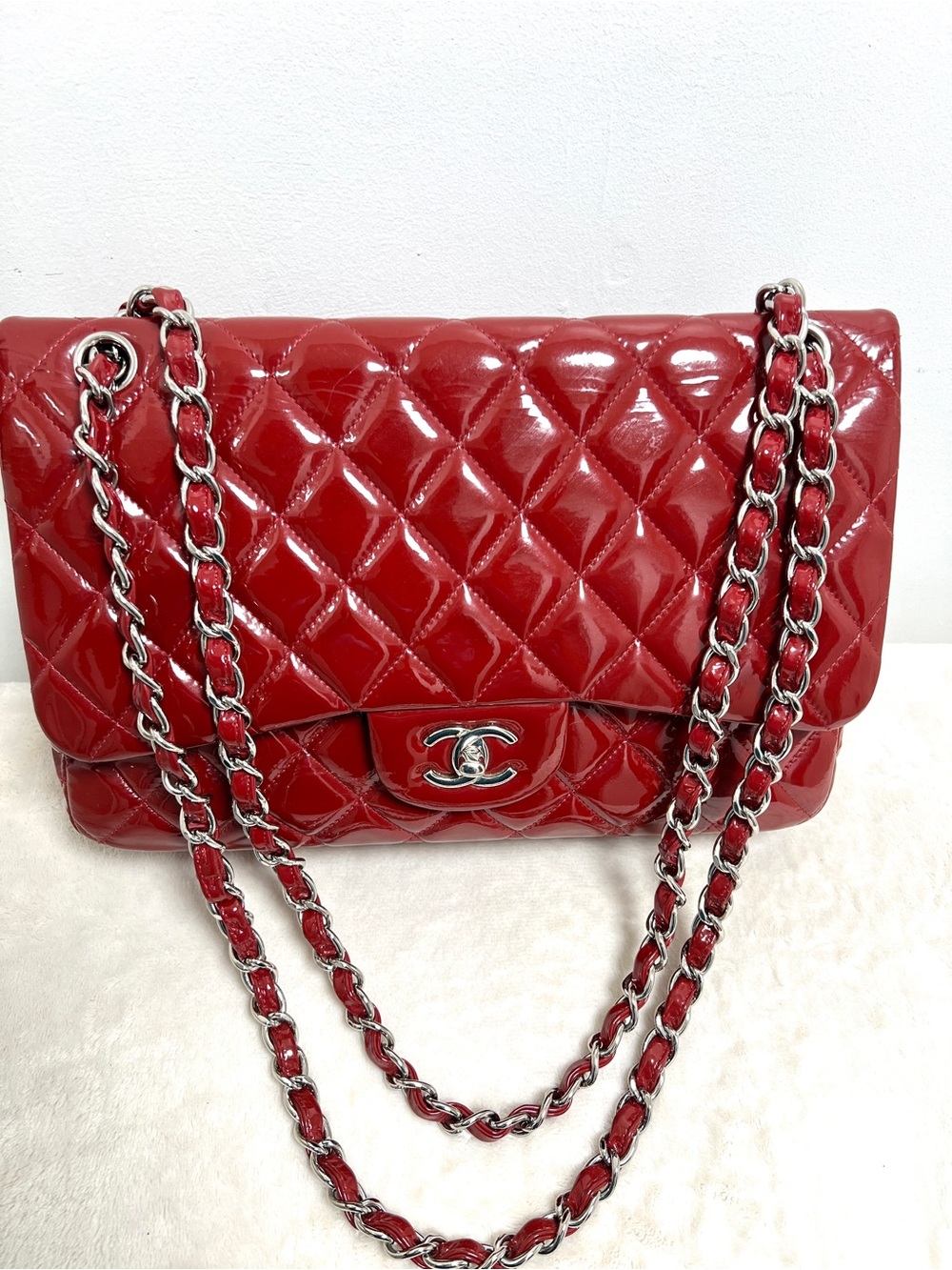 CHANEL Red Patent Leather Jumbo Classic Flap Bag.